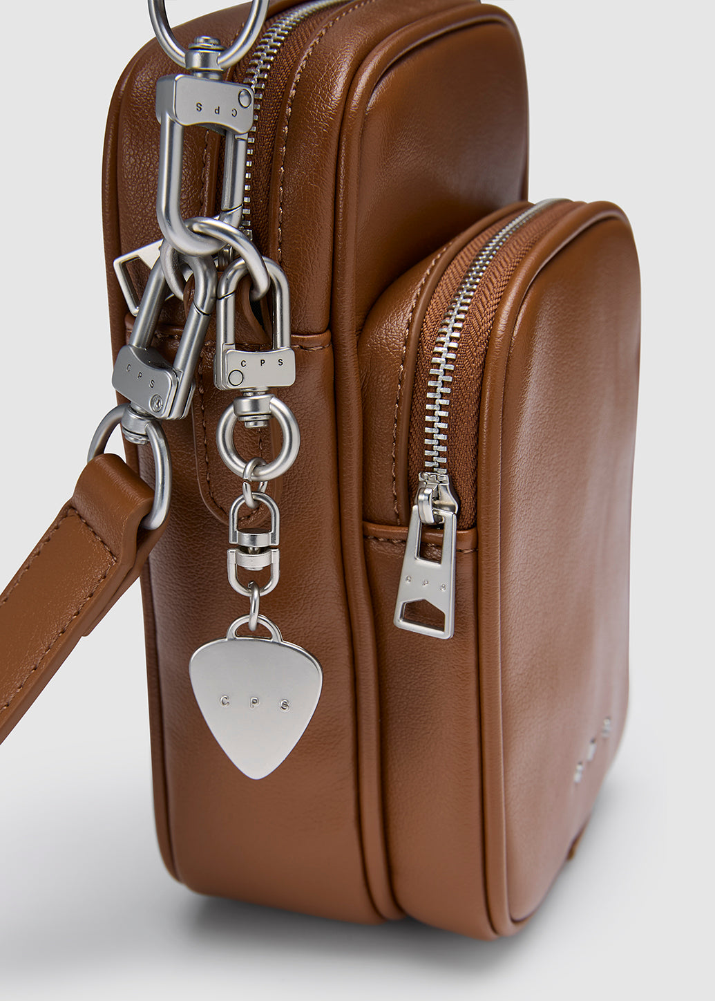 DUAL-ZIP COMPACT CROSSBODY BAG