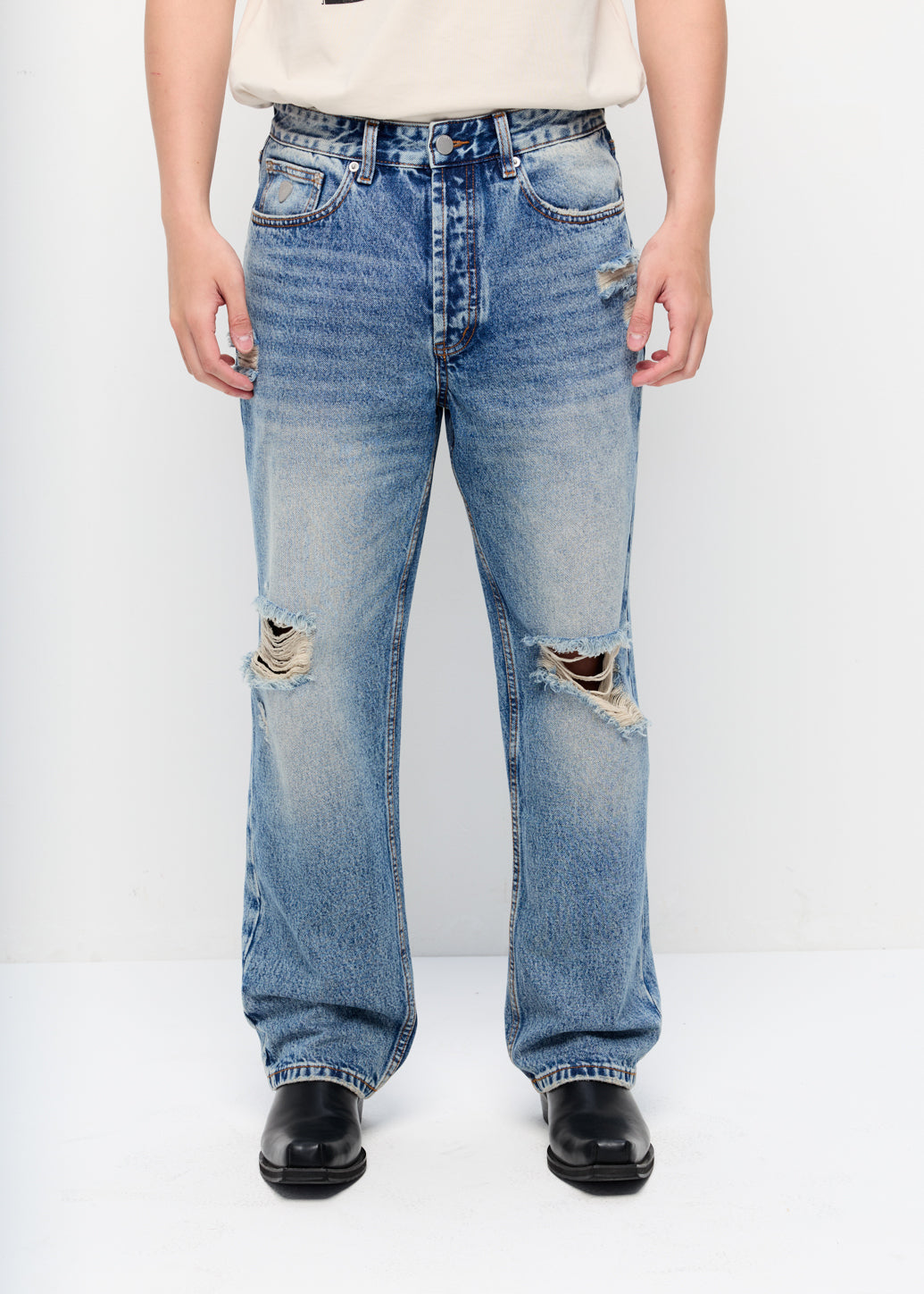 VINTAGE DISTRESSED JEANS