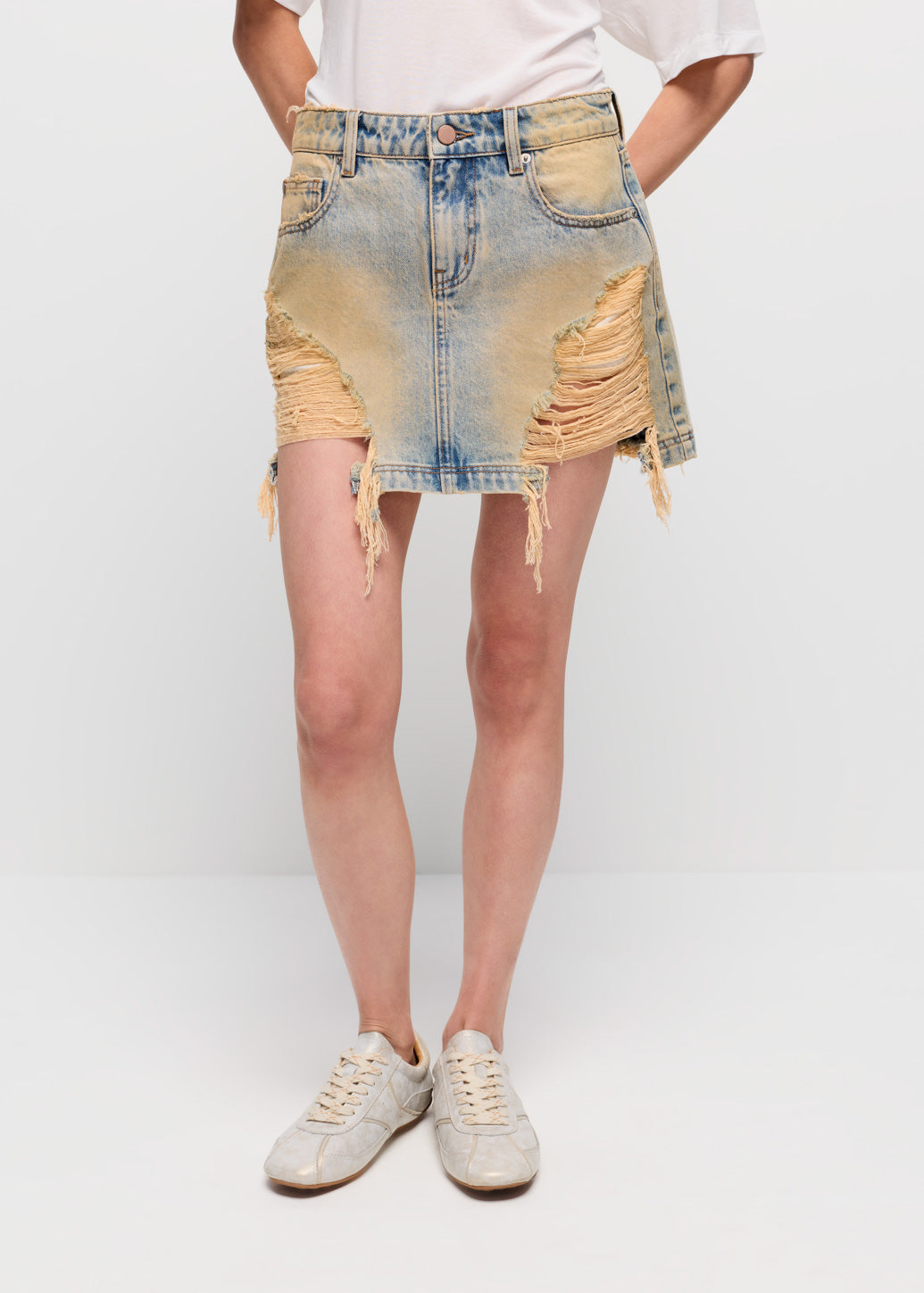 DISTRESSED DENIM MINI SKIRT