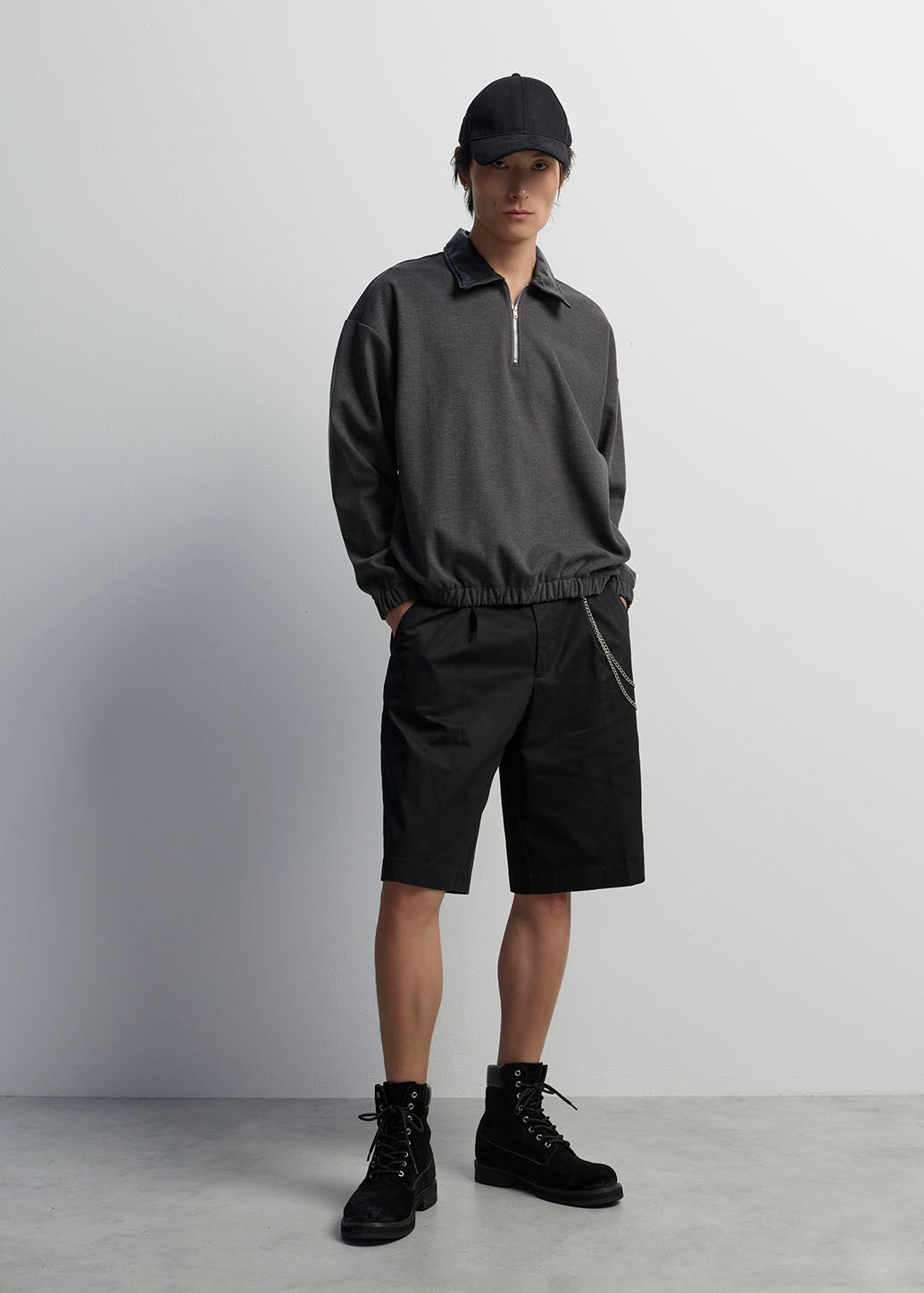 PLEATED BERMUDA SHORTS WITH CHAIN DETAIL