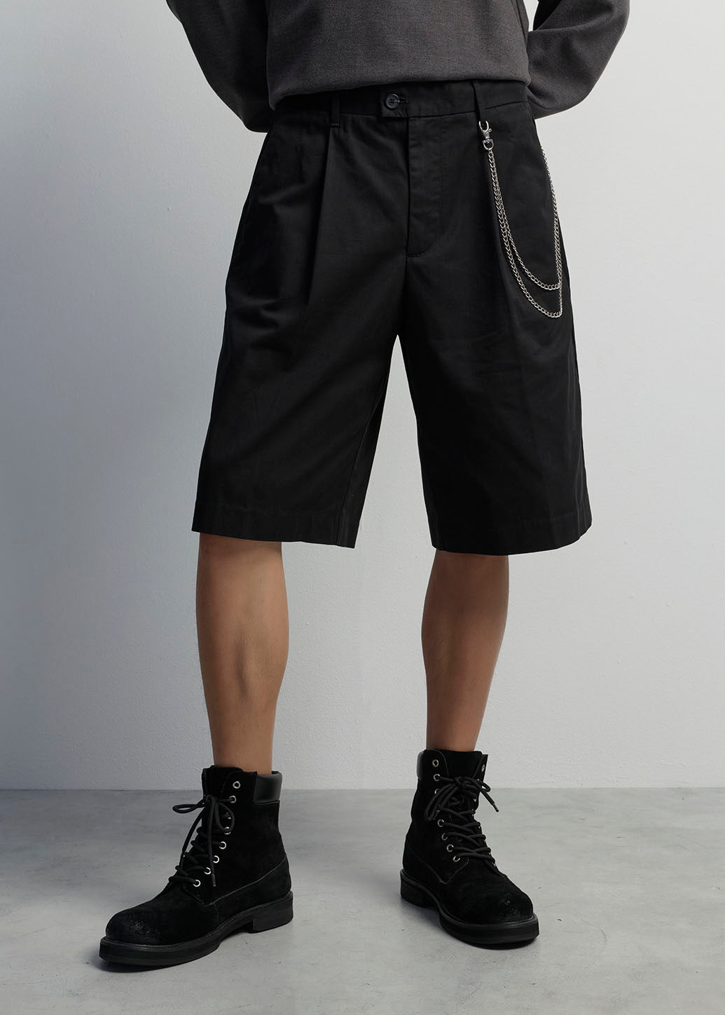 PLEATED BERMUDA SHORTS WITH CHAIN DETAIL