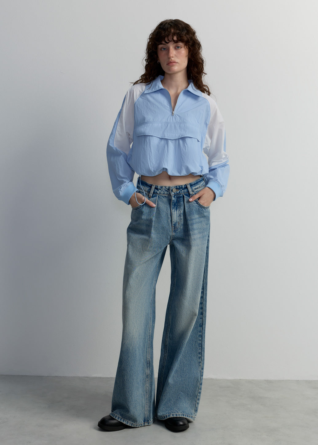 PLEATED WAIST WIDE-LEG JEANS