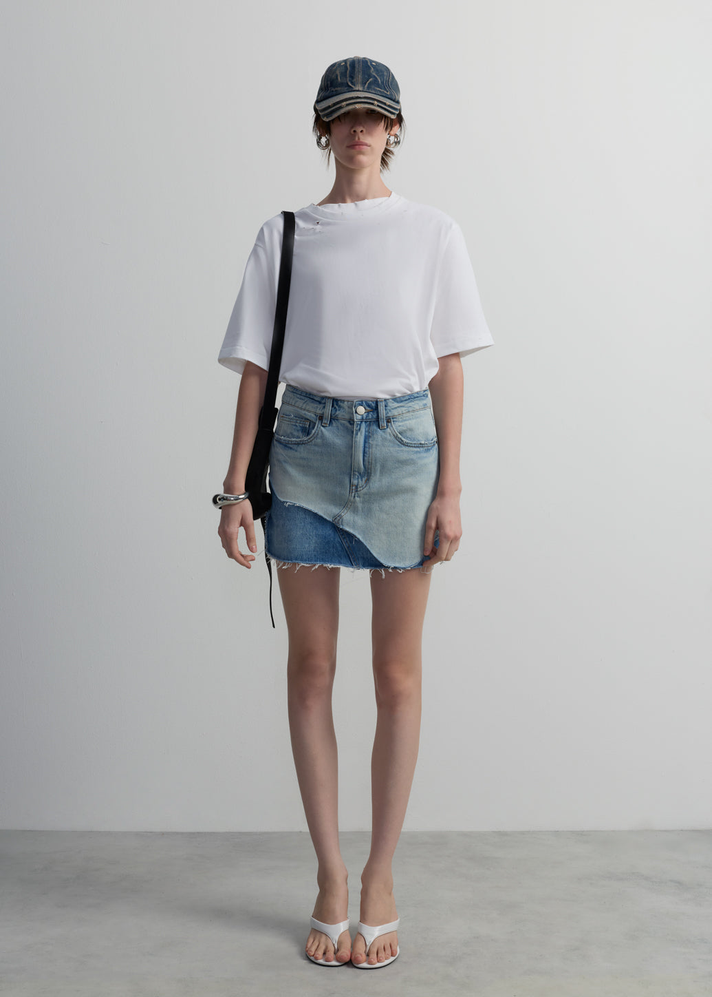 RECONSTRUCTED EDGE DENIM SKIRT