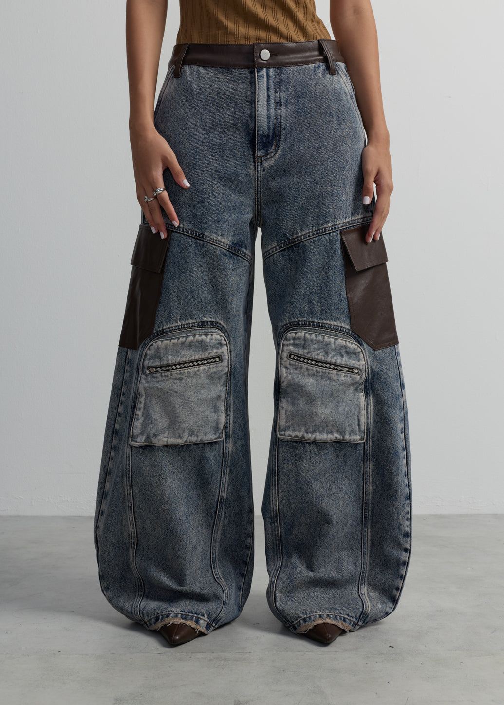 LEATHER PANELED WIDE-LEG JEANS