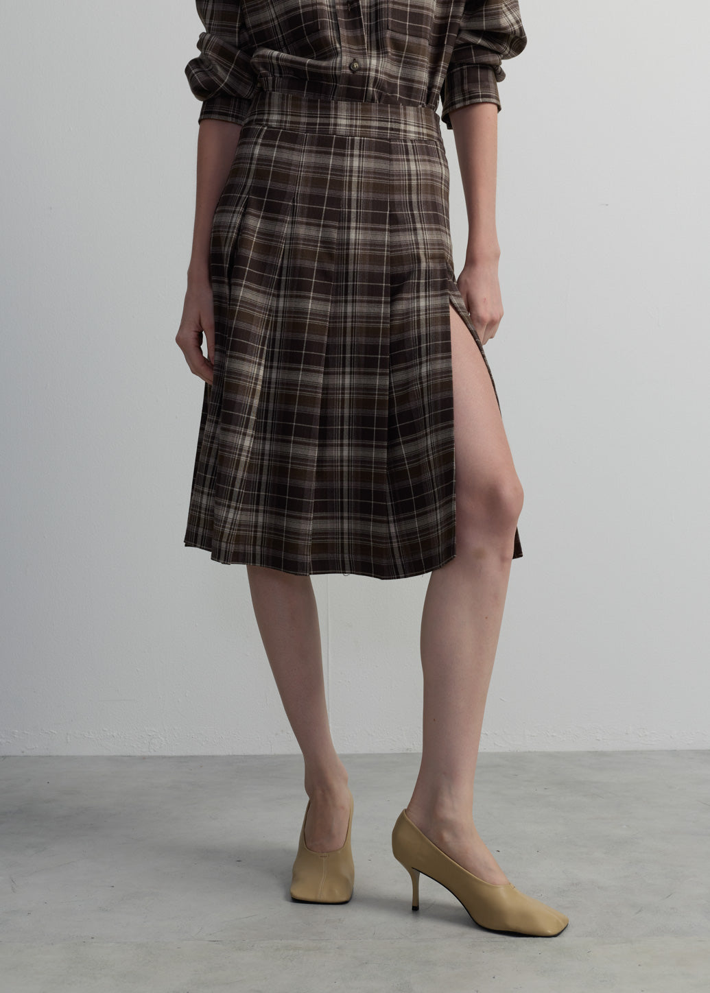 CHECKED PLEATED MIDI SKIRT