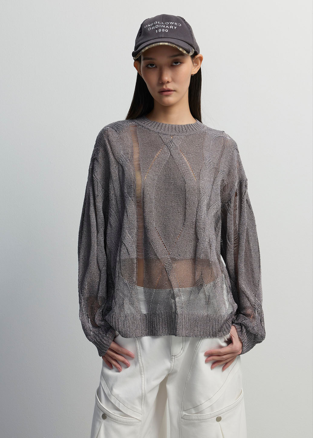 CABLE-KNIT DISTRESSED OVERSIZED SWEATER