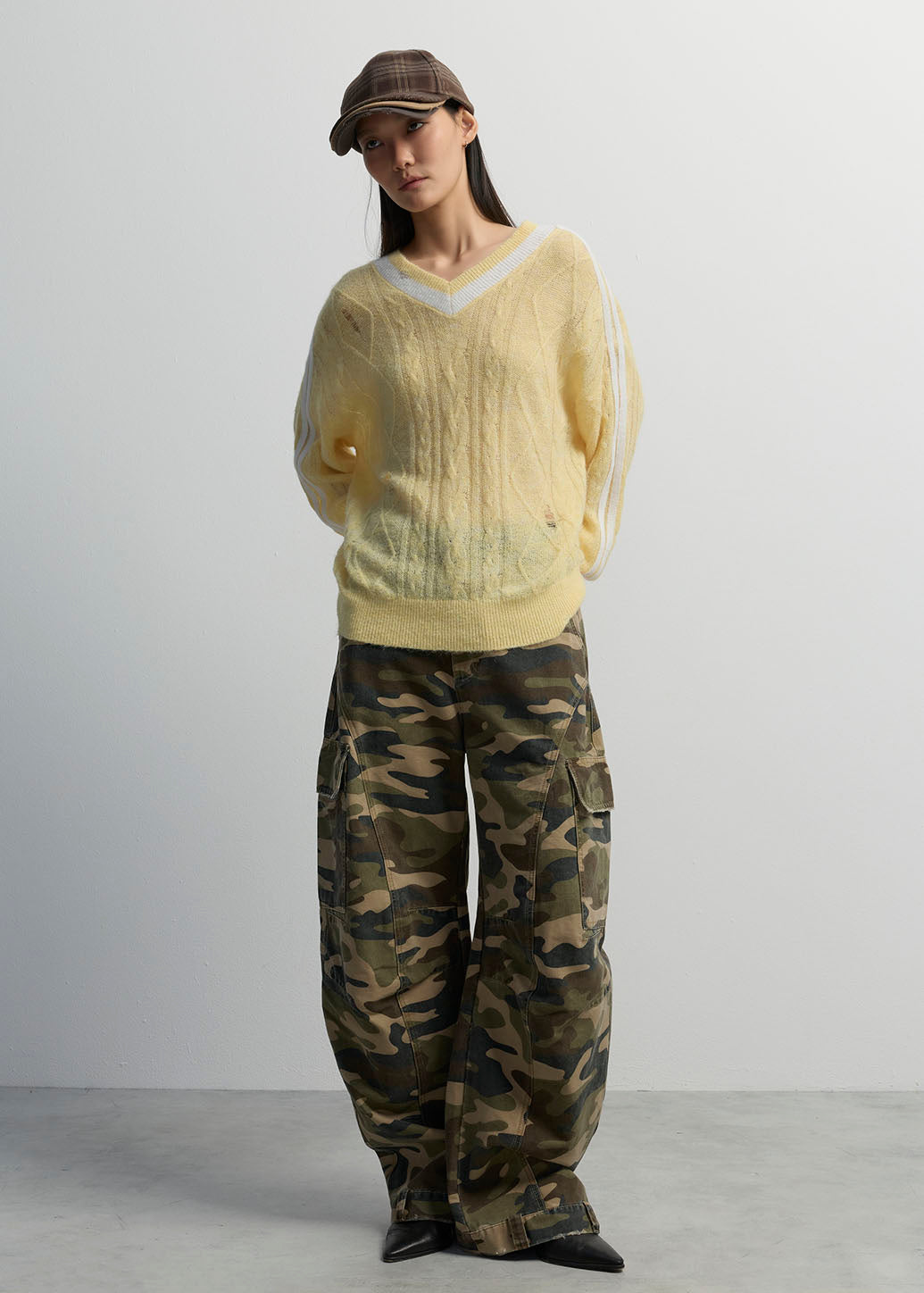 DISTRESSED CABLE KNIT V-NECK SWEATER