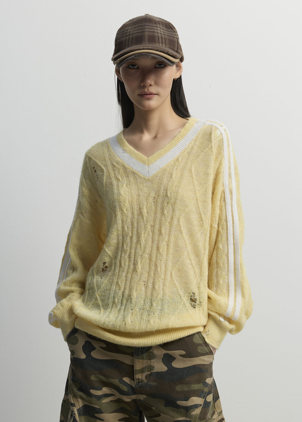DISTRESSED CABLE KNIT V-NECK SWEATER